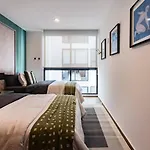Urban Elegance Apartment With Balcony Views